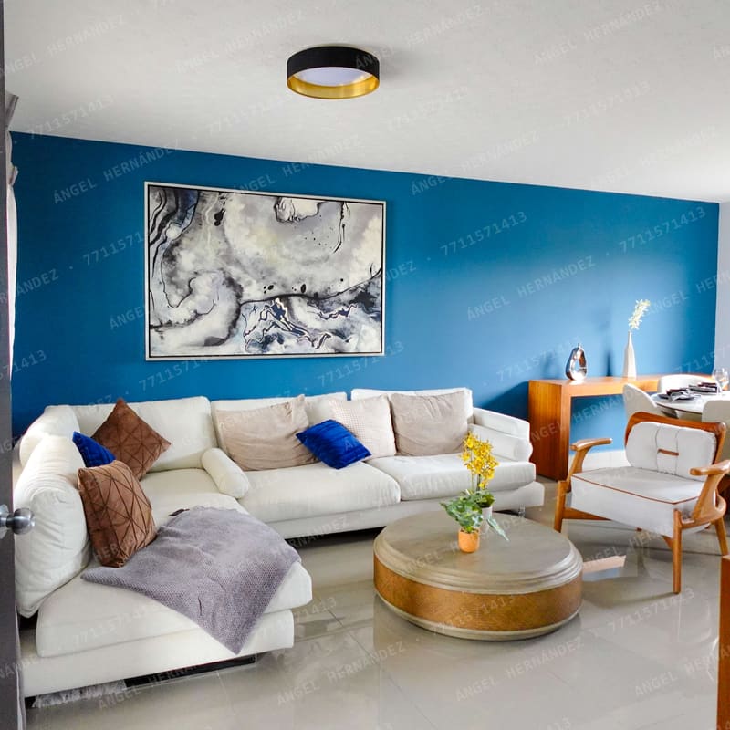 Sala con iluminación natural en casa muestra Amaral Ampliada, Señeros